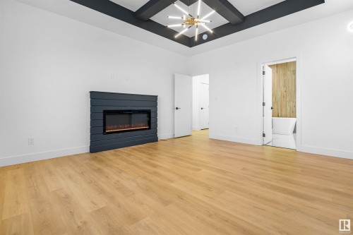 745 Astoria Way, Devon, AB - Indoor Photo Showing Living Room With Fireplace