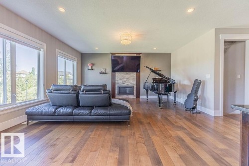 4136 Charles Link Link, Edmonton, AB - Indoor Photo Showing Living Room With Fireplace