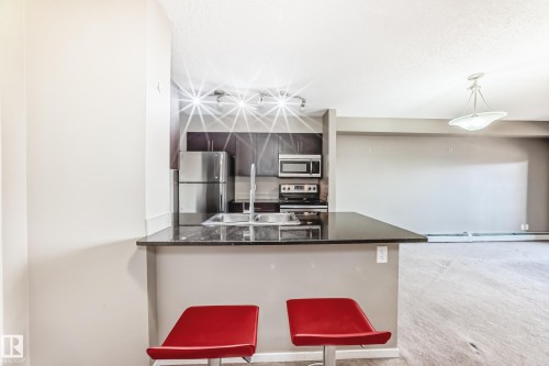 418 3315 James Mowatt Trail, Edmonton, AB - Indoor Photo Showing Kitchen With Stainless Steel Kitchen With Upgraded Kitchen