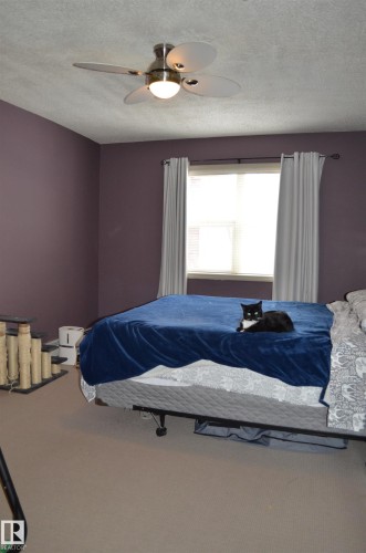 111 11445 Ellerslie Road, Edmonton, AB - Indoor Photo Showing Bedroom