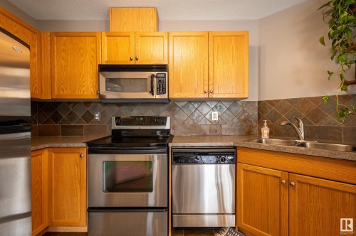 50 150 Edwards Drive, Edmonton, AB - Indoor Photo Showing Kitchen With Stainless Steel Kitchen With Double Sink