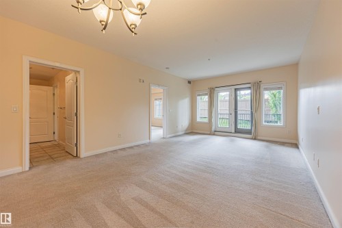110 1406 Hodgson Way, Edmonton, AB - Indoor Photo Showing Other Room