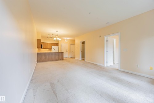 110 1406 Hodgson Way, Edmonton, AB - Indoor Photo Showing Other Room