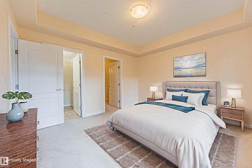 110 1406 Hodgson Way, Edmonton, AB - Indoor Photo Showing Bedroom