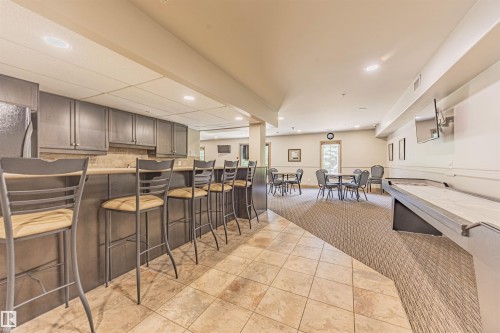 110 1406 Hodgson Way, Edmonton, AB - Indoor Photo Showing Other Room