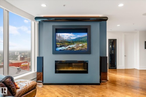 3402 10152 104 Street, Edmonton, AB - Indoor Photo Showing Living Room With Fireplace