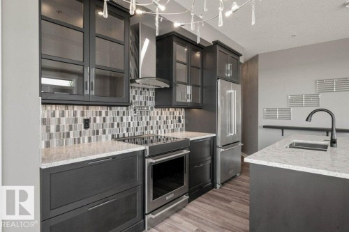 412 10518 113 Street, Edmonton, AB - Indoor Photo Showing Kitchen With Double Sink With Upgraded Kitchen