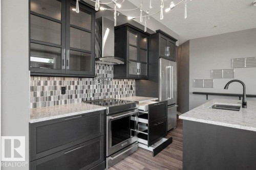 412 10518 113 Street, Edmonton, AB - Indoor Photo Showing Kitchen With Upgraded Kitchen