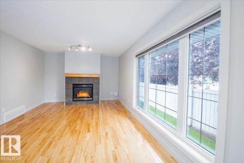 10904 72 Avenue, Edmonton, AB - Indoor Photo Showing Living Room With Fireplace