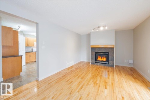 10904 72 Avenue, Edmonton, AB - Indoor Photo Showing Living Room With Fireplace