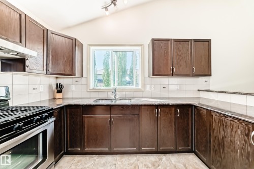 1443 37C Avenue, Edmonton, AB - Indoor Photo Showing Kitchen With Double Sink