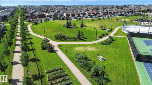 Aerial perspective of suburban area with a community park - 5621 Hawthorn Way, Edmonton, AB - Outdoor With View