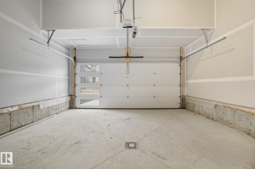9102 Elves Loop Nw, Edmonton, AB - Indoor Photo Showing Garage