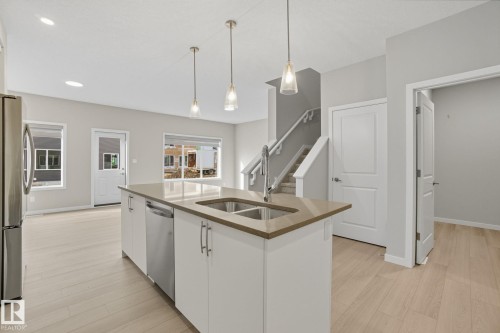 9102 Elves Loop Nw, Edmonton, AB - Indoor Photo Showing Kitchen With Double Sink With Upgraded Kitchen