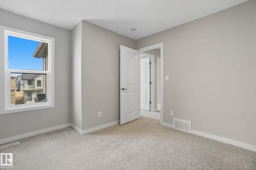 9102 Elves Loop Nw, Edmonton, AB - Indoor Photo Showing Other Room