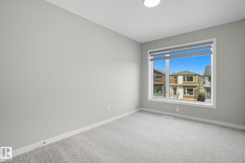 9102 Elves Loop Nw, Edmonton, AB - Indoor Photo Showing Other Room