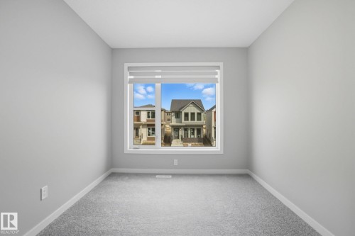 9102 Elves Loop Nw, Edmonton, AB - Indoor Photo Showing Other Room