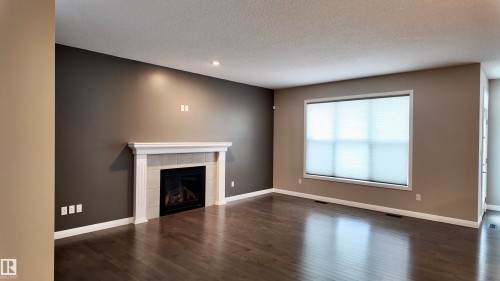 3875 Agar Green, Edmonton, AB - Indoor With Fireplace