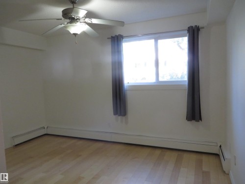 102 10547 83 Avenue, Edmonton, AB - Indoor Photo Showing Other Room
