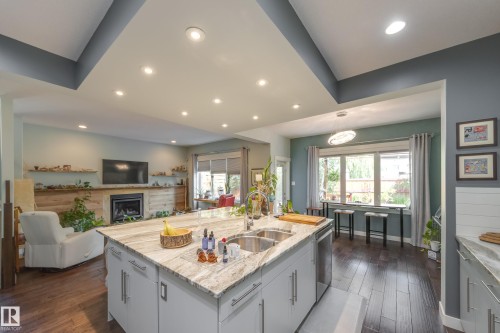 3721 Parker Court, Edmonton, AB - Indoor Photo Showing Kitchen With Fireplace With Double Sink With Upgraded Kitchen