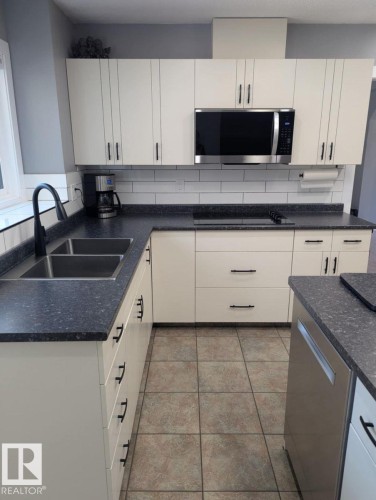 11019 10 Avenue, Edmonton, AB - Indoor Photo Showing Kitchen With Double Sink