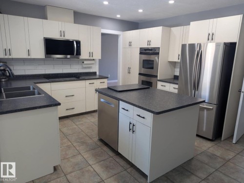 11019 10 Avenue, Edmonton, AB - Indoor Photo Showing Kitchen With Double Sink
