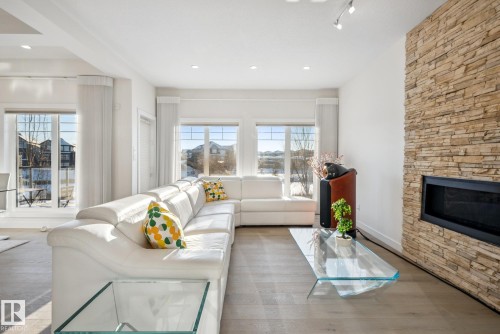 3811 Kidd Bay, Edmonton, AB - Indoor Photo Showing Living Room With Fireplace