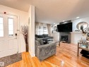 223 61 Street, Edmonton, AB  - Indoor Photo Showing Living Room With Fireplace 
