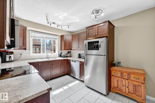 11005 162A Avenue, Edmonton, AB - Indoor Photo Showing Kitchen With Stainless Steel Kitchen With Double Sink
