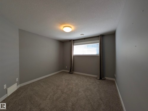 34 3090 Cameron Heights Way, Edmonton, AB - Indoor Photo Showing Other Room
