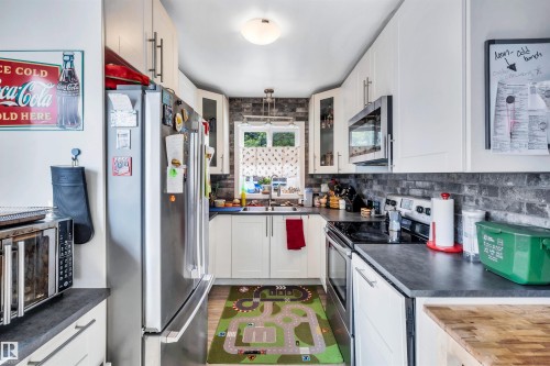 9516 63 Avenue, Edmonton, AB - Indoor Photo Showing Kitchen With Double Sink