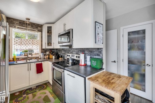 9516 63 Avenue, Edmonton, AB - Indoor Photo Showing Kitchen With Double Sink