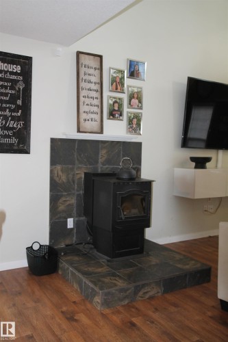 5206 54A Street, Elk Point, AB - Indoor With Fireplace