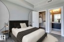 Bedroom featuring wood finished floors and ensuite bathroom - 9922 111 Street, Edmonton, AB  - Indoor Photo Showing Bedroom 