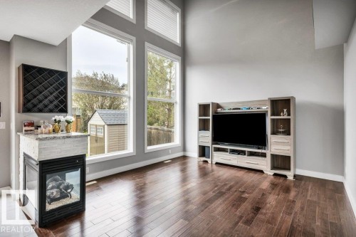1339 Adamson Drive, Edmonton, AB - Indoor Photo Showing Living Room With Fireplace