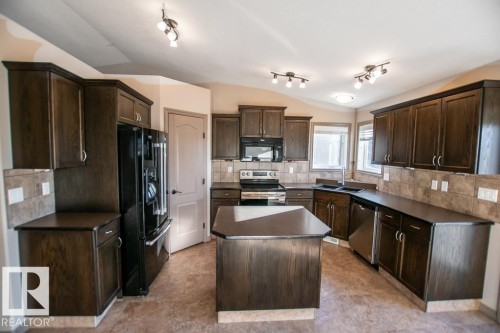 3814 45 Avenue, Bonnyville Town, AB - Indoor Photo Showing Kitchen With Double Sink