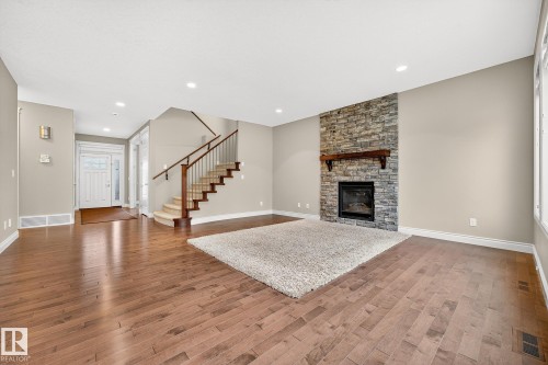 2121 90A Street, Edmonton, AB - Indoor Photo Showing Living Room With Fireplace