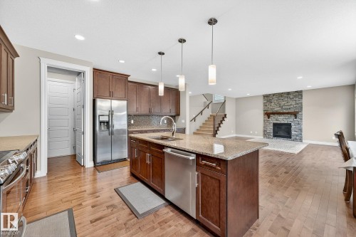 2121 90A Street, Edmonton, AB - Indoor Photo Showing Kitchen With Fireplace With Upgraded Kitchen
