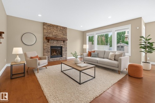 2121 90A Street, Edmonton, AB - Indoor Photo Showing Living Room With Fireplace