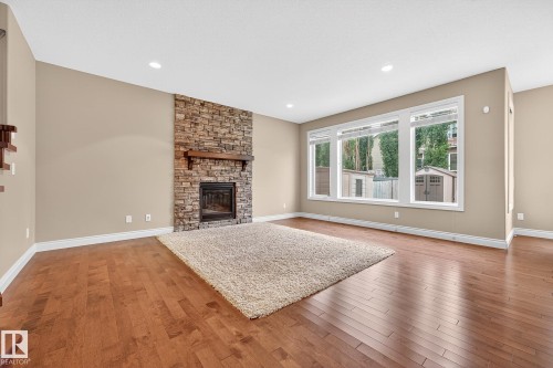 2121 90A Street, Edmonton, AB - Indoor Photo Showing Living Room With Fireplace