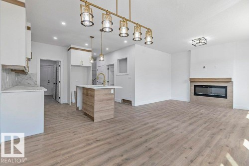 65 Silverstone Drive, Stony Plain, AB - Indoor With Fireplace