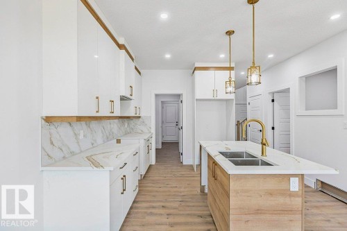 65 Silverstone Drive, Stony Plain, AB - Indoor Photo Showing Kitchen With Double Sink With Upgraded Kitchen