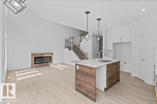 65 Silverstone Drive, Stony Plain, AB - Indoor With Fireplace