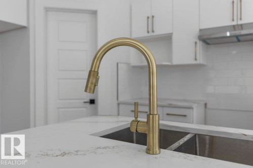 65 Silverstone Drive, Stony Plain, AB - Indoor Photo Showing Kitchen