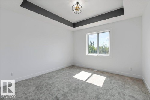 65 Silverstone Drive, Stony Plain, AB - Indoor Photo Showing Other Room
