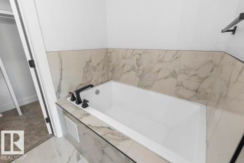 65 Silverstone Drive, Stony Plain, AB - Indoor Photo Showing Bathroom
