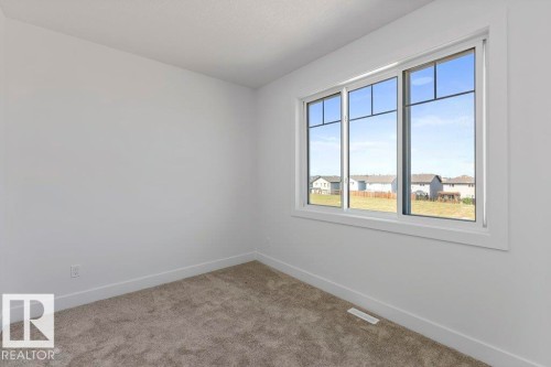 65 Silverstone Drive, Stony Plain, AB - Indoor Photo Showing Other Room