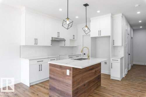 65 Silverstone Drive, Stony Plain, AB - Indoor Photo Showing Kitchen With Upgraded Kitchen