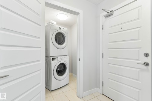 810 5151 Windermere Boulevard, Edmonton, AB - Indoor Photo Showing Laundry Room