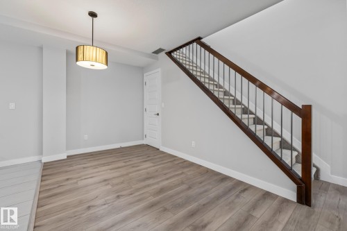 810 5151 Windermere Boulevard, Edmonton, AB - Indoor Photo Showing Other Room